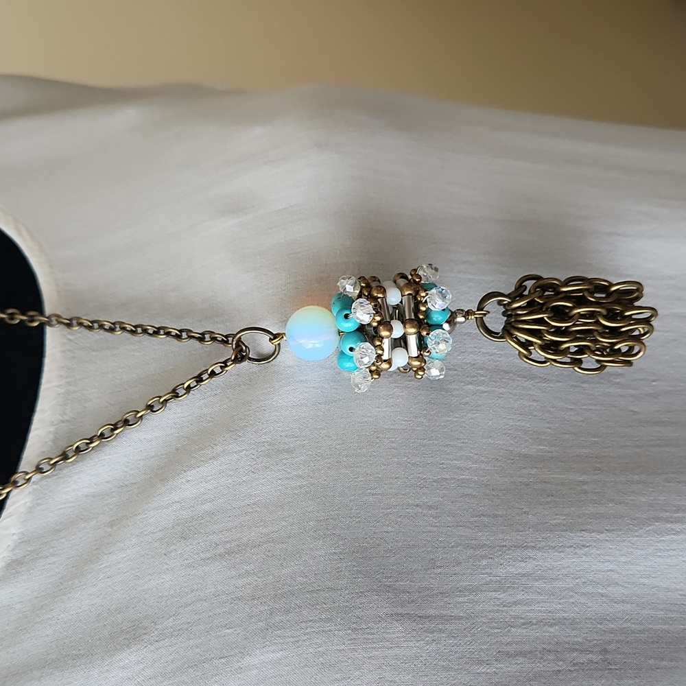 PAM HIRAN Brass Dianthus Tassel Pendant Necklace from Anthropologie